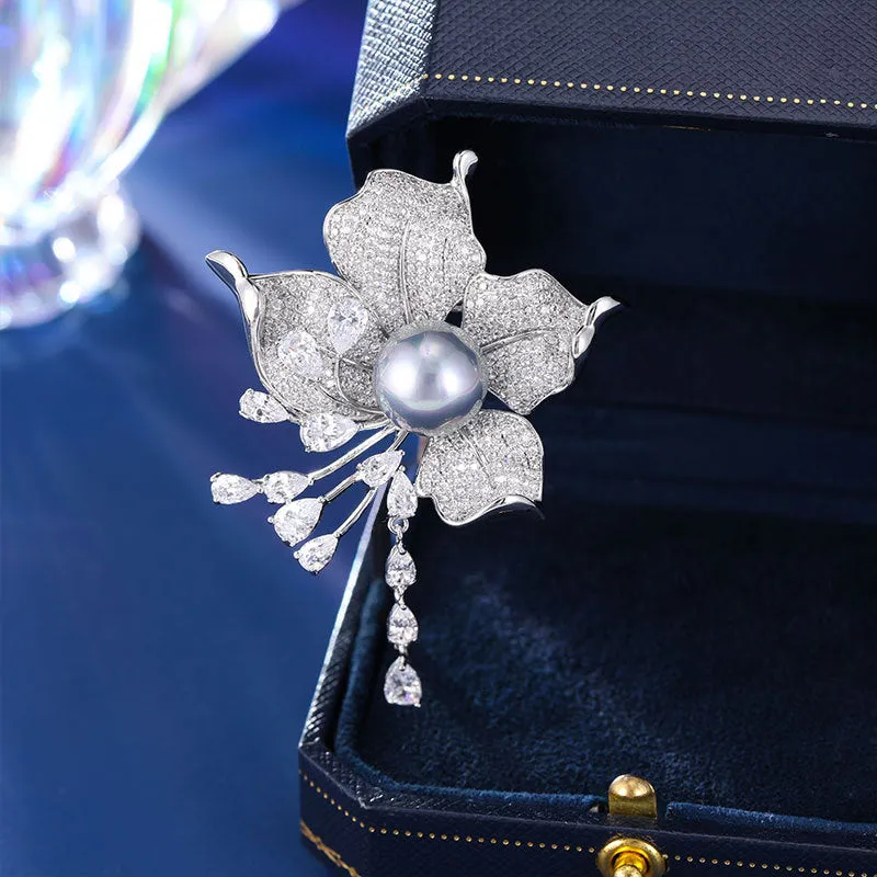 Multi-purpose suit jacket pearl brooch accessories.